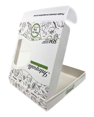 Caixa personalizada branca e verde aberta, com visor frontal e impressão de ingredientes naturais