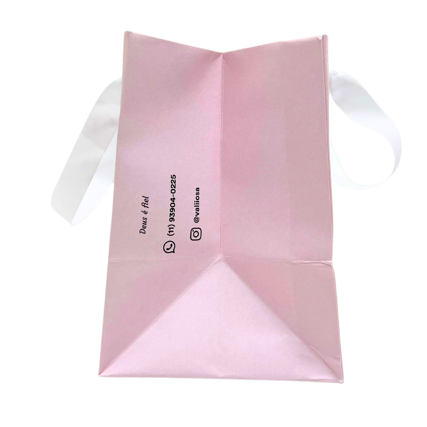 Sacola de papel Offset 180g personalizada, 20x11x15 cm, com design promocional, incluindo mensagem, contatos e redes sociais, alças brancas elegantes.
