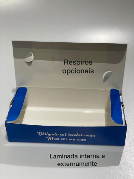 Interior da embalagem aberta com respiros opcionais na tampa.
